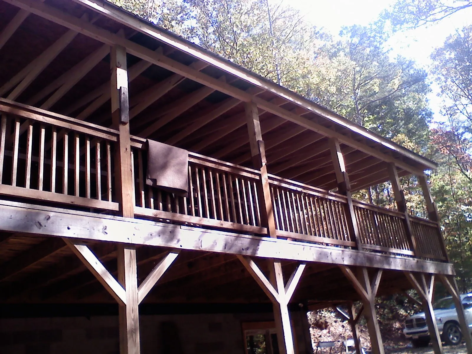 Timber framing under a new elevated porch and deck — Roof Leak Repair in Albertson by Roofing Brothers